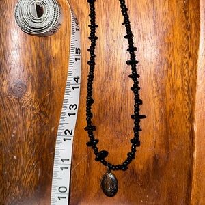 Locket on black chip bead necklace